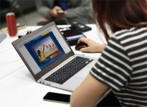 Student working on a laptop with Cabri II Plus